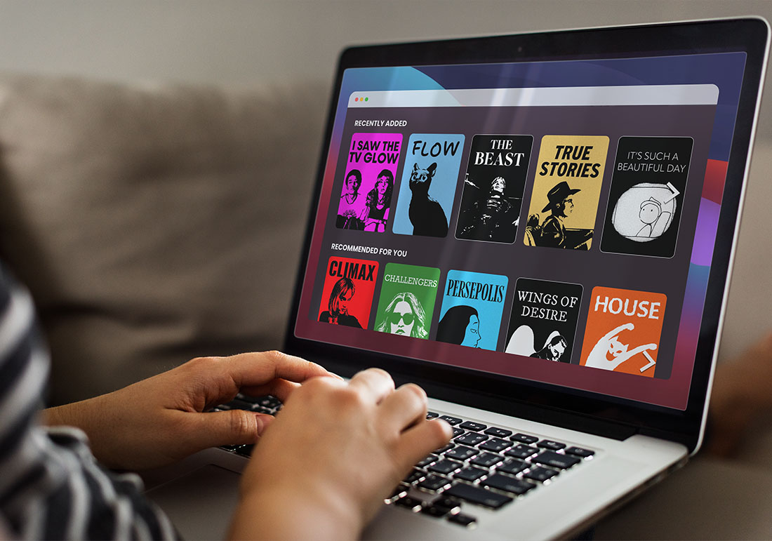 The homepage for Frame+ on a laptop