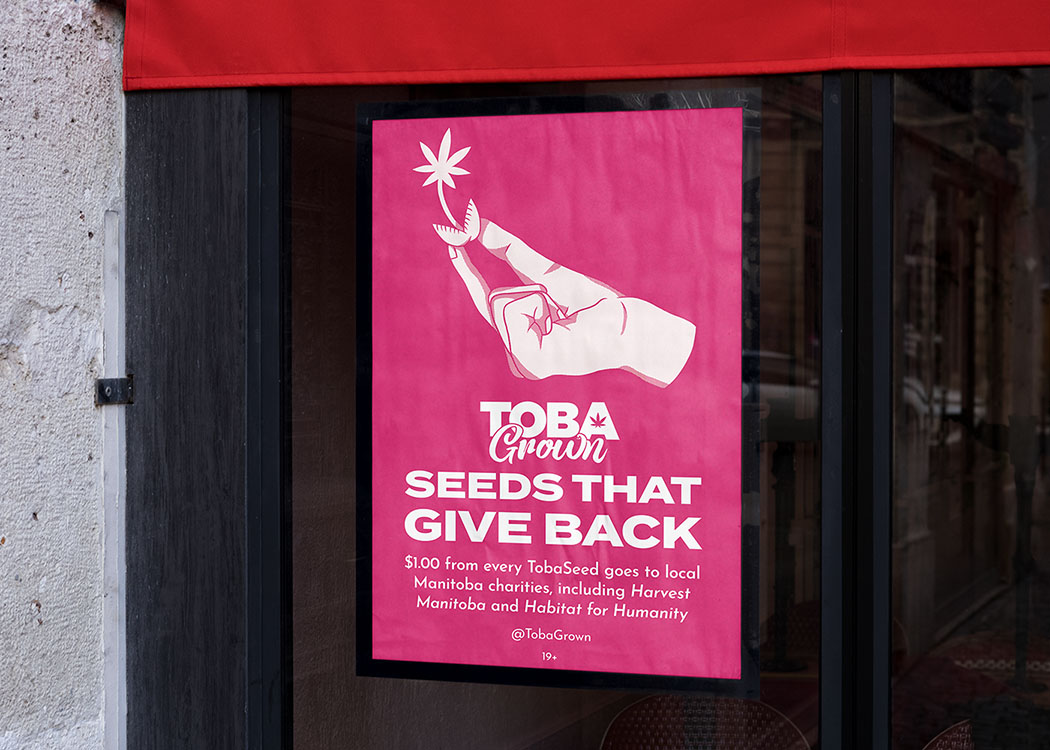 A TobaGrown seed promotional poster placed on a window